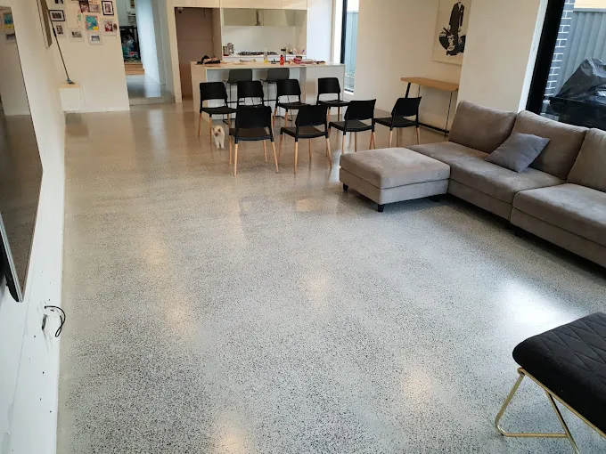 A polished concrete flooring finish with a glossy sheen